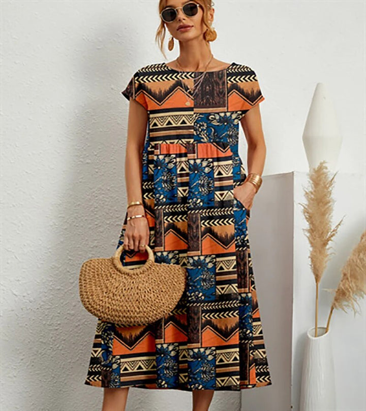 SOLE – FIGURBETONTES ÄTHERISCHES FLORAL-KLEID