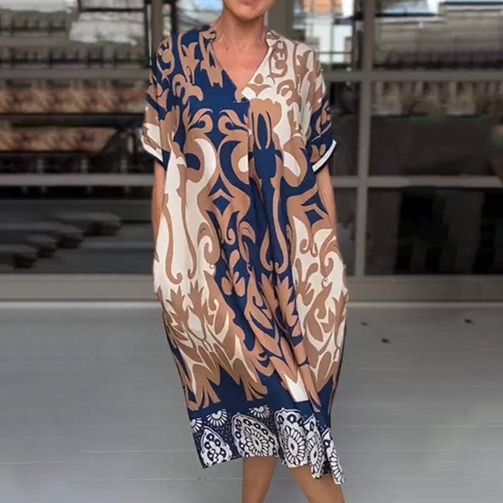 AURA – VIBRANT BEDRUCKTES MIDI-KLEID