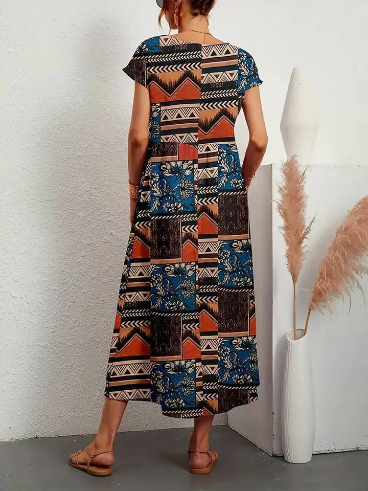 SOLE – FIGURBETONTES ÄTHERISCHES FLORAL-KLEID